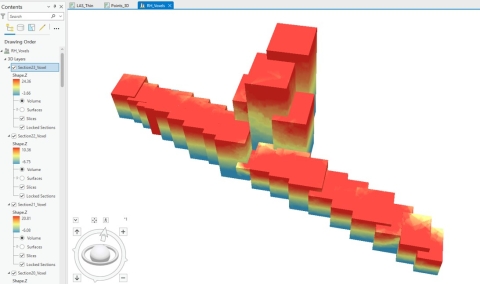 Screenshot of a computer program showing stacked 3D boxes with gradient coloration in the approximate configuration of a building with a tower in the center.