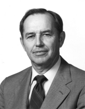 black and white portrait of a light-skinned man in a suit and tie