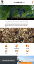 Screenshot of the Great Lakes Center webpage. Satellite image of the Great Lakes, quagga mussels, description of the GLC, navigation icons, Buffalo State University logo, site menu.