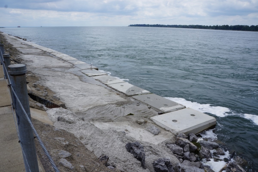 Blocks and concrete along a pier in a river